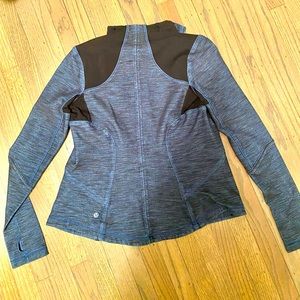 Blue and black Lululemon fitted zip up jacket